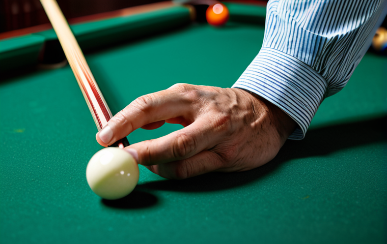 A focused professional male billiards player, dressed in a modest polo shirt, holding a cue with a premium Irish linen grip. His hand is in a natural pose, perfectly aligned with the cue, showcasing the seamless "second skin" feeling. The scene is set in a well-lit, professional billiards hall, with subtle bokeh in the background. The image emphasizes the deep connection between player and cue. safe for work, appropriate content, fully clothed, professional, perfect anatomy, correct proportions, well-formed hands, proper finger count, natural body proportions, high quality, realistic photography.